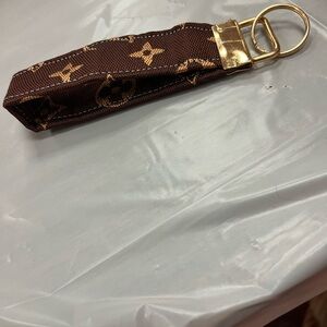 Brown Monogram Wristlet Keychain with Gold Hardware